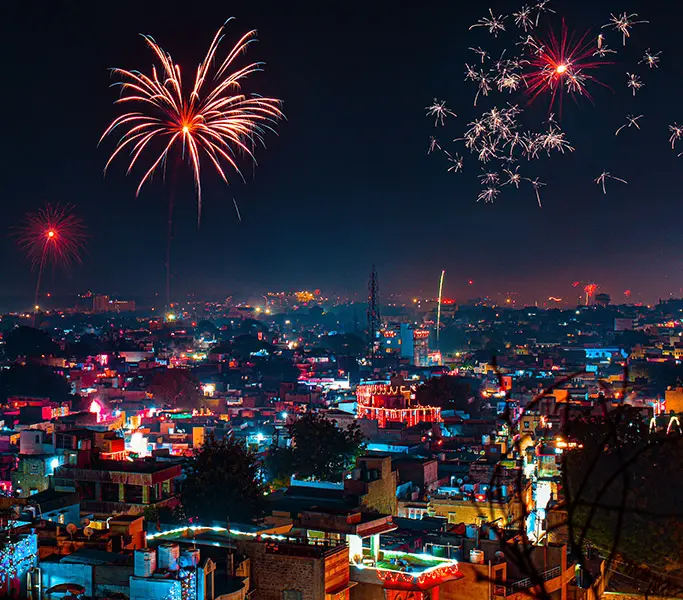 Fire cracker lighting up the sky during Diwali night